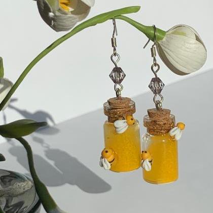 Yellow earrings, miniature honey bo..